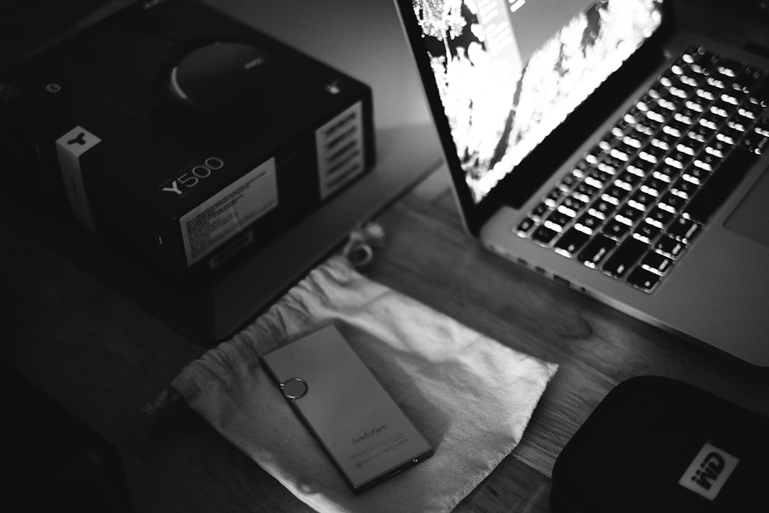 turned on laptop near items