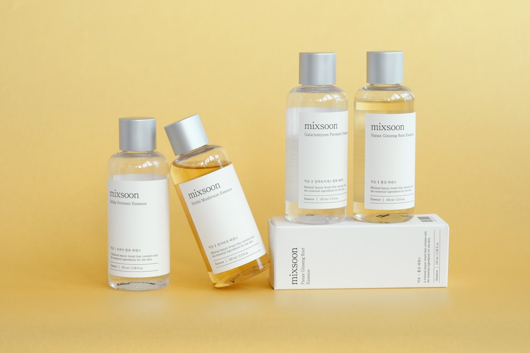 Bottles of skincare products are displayed.