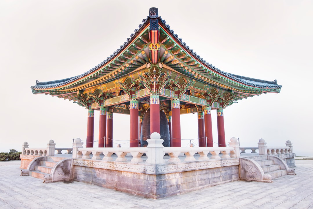 a tall building with a tower in the middle of it