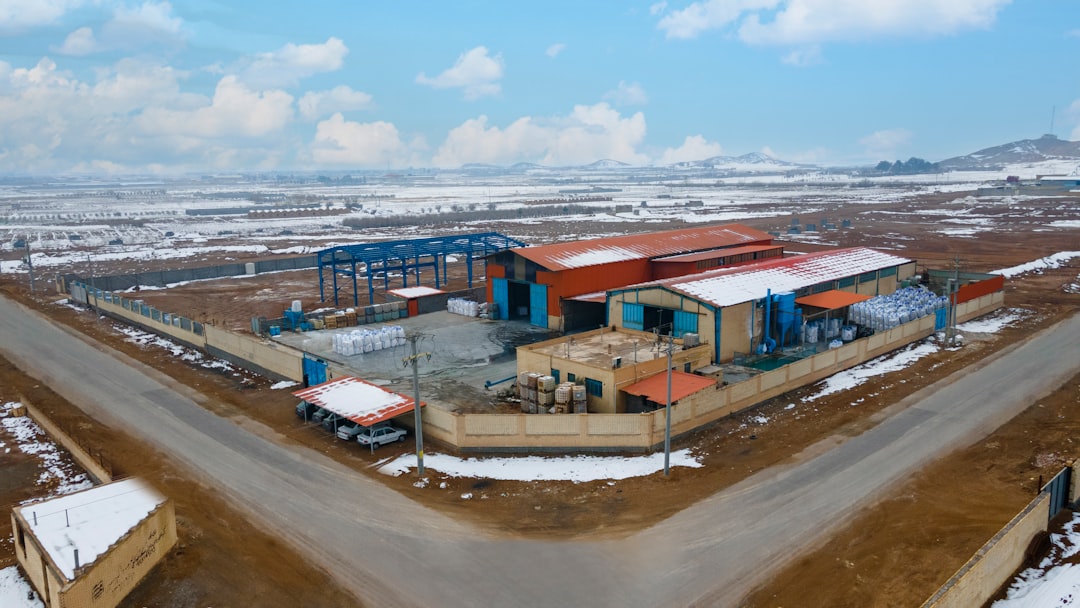 an aerial view of a building in the middle of nowhere