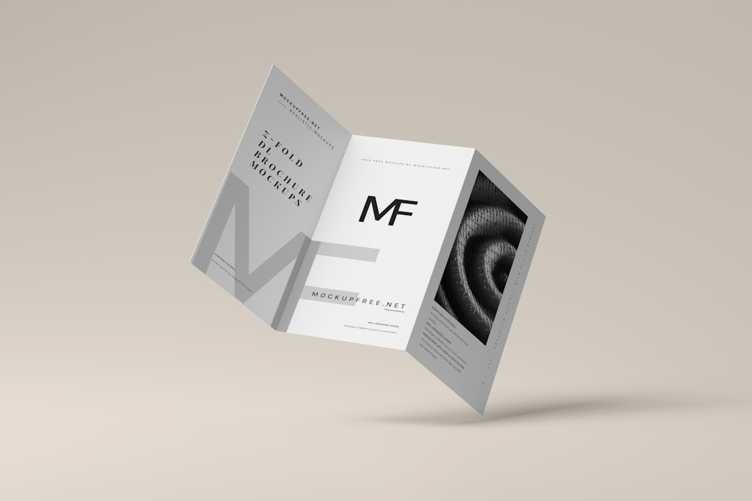 a folded brochure with a black and white photo