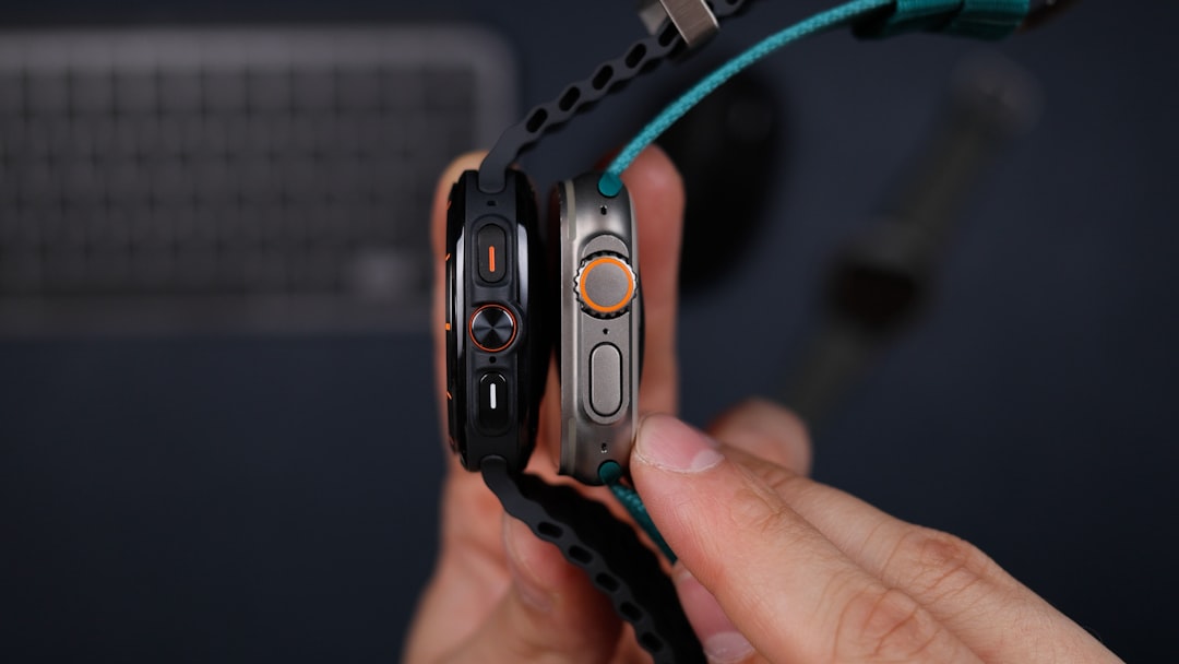 A person holding a smart phone in their hand