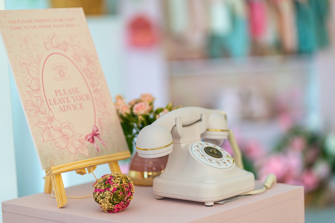 Vintage rotary phone with floral decorations