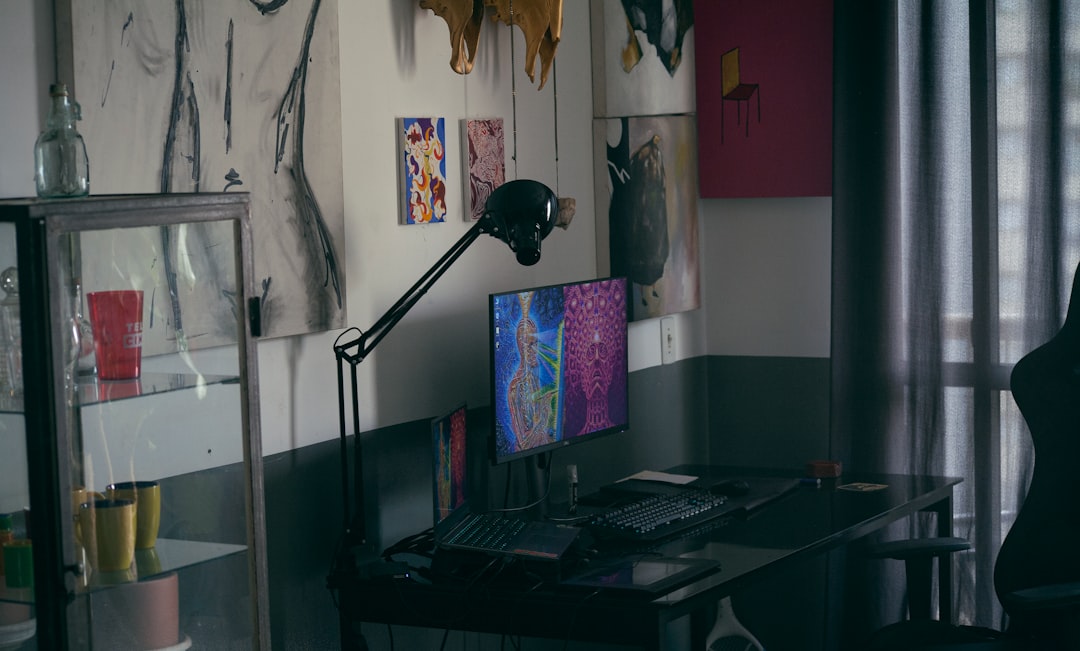 black flat screen tv on black wooden tv rack