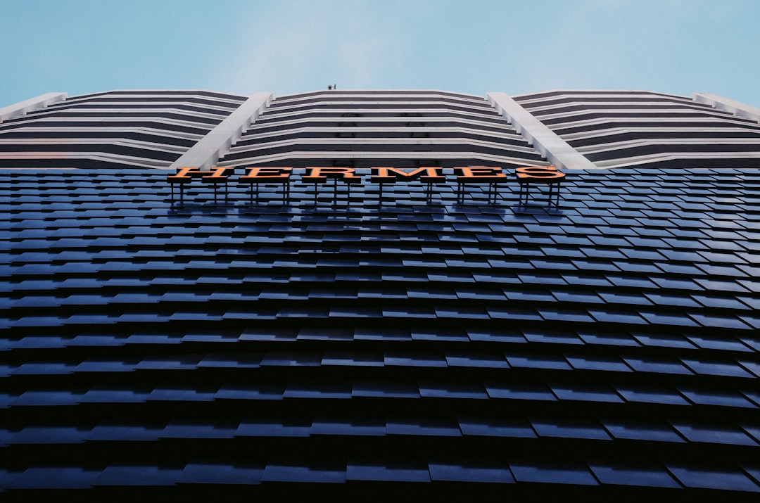 A tall building with a sign on top of it