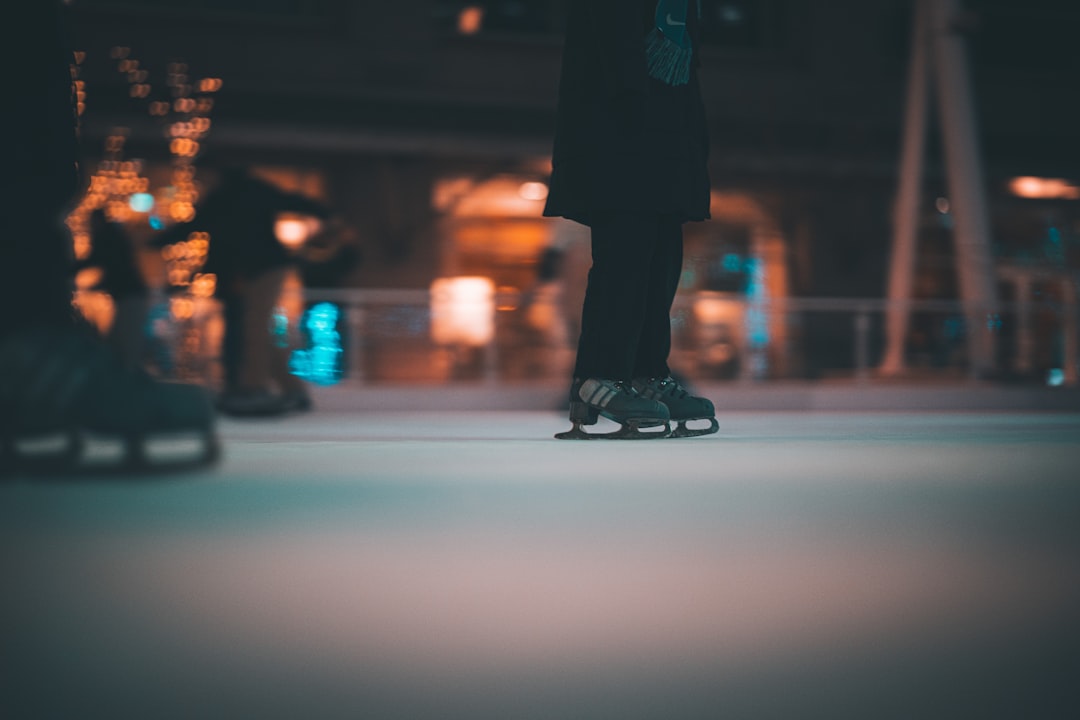 a person standing on top of a skateboard on a street