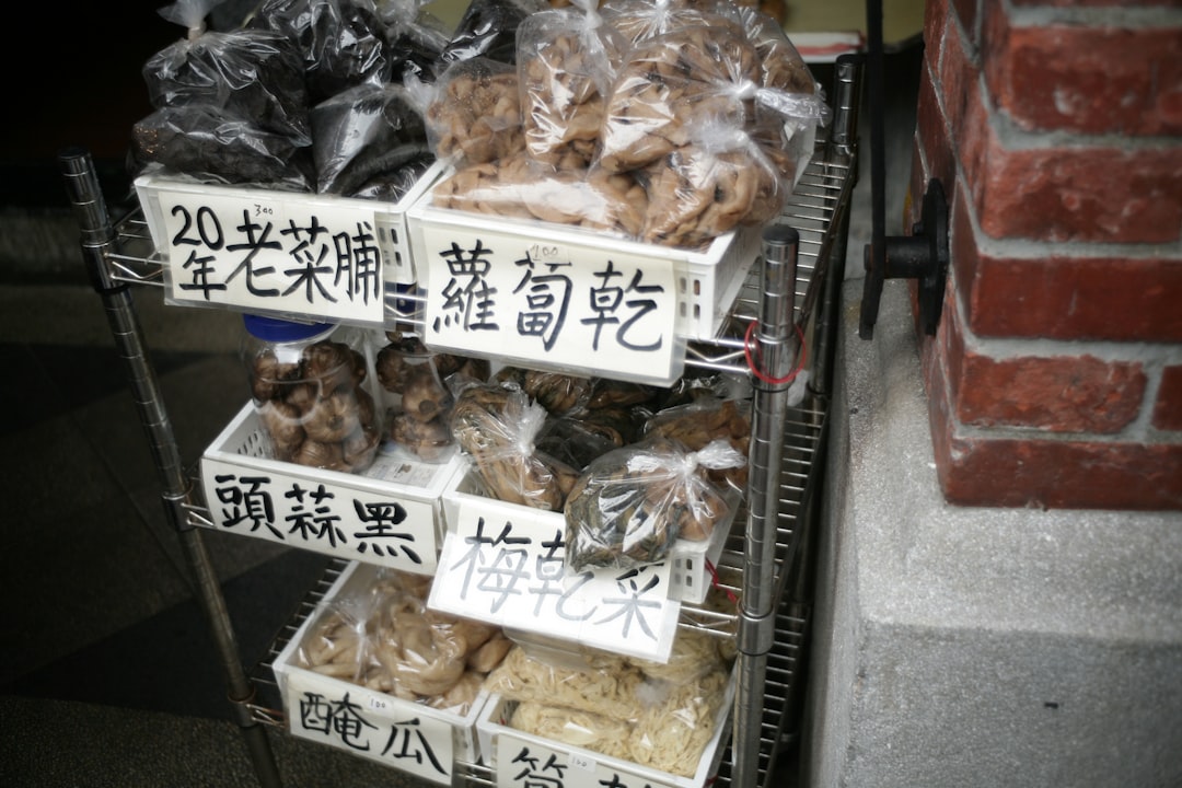 Dried food products are displayed on a metal rack.