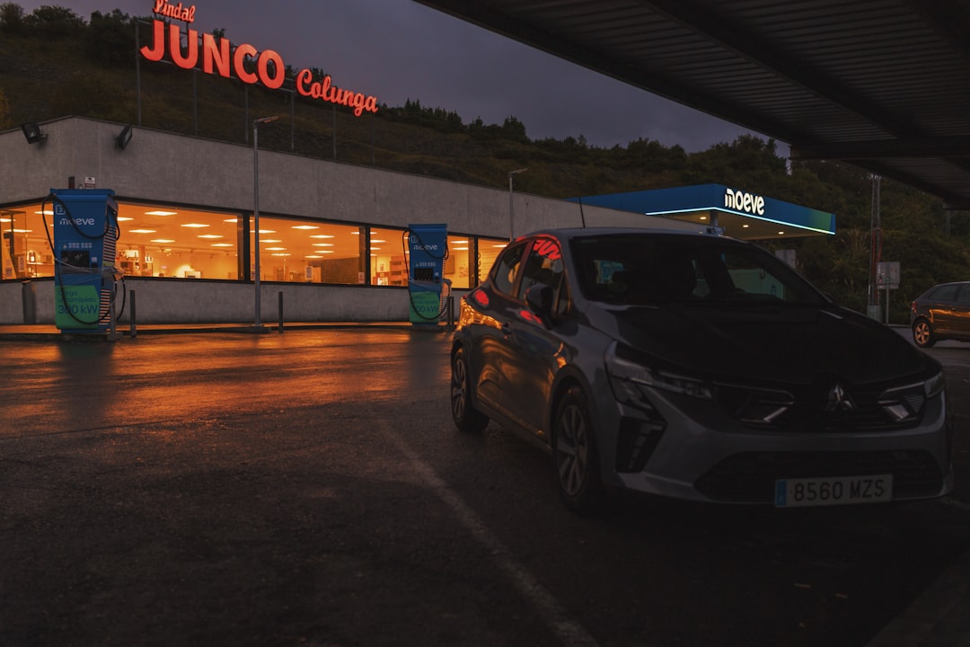Car at a gas station at dusk