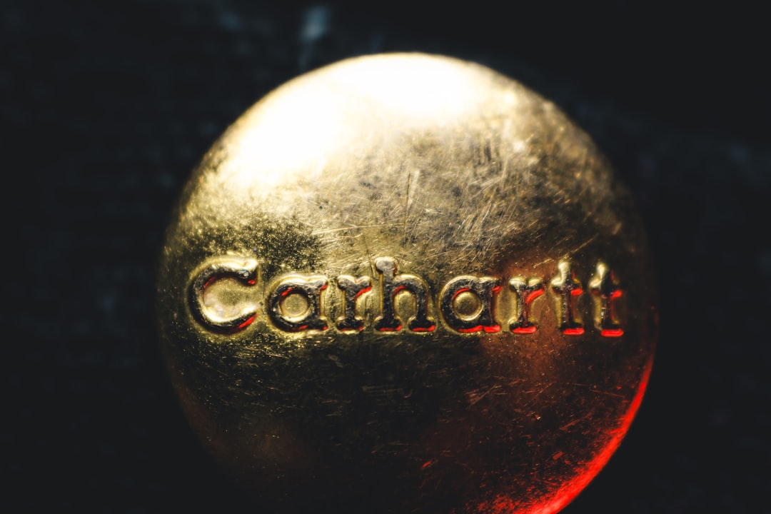 A close up of a golden ball with the word comfort on it