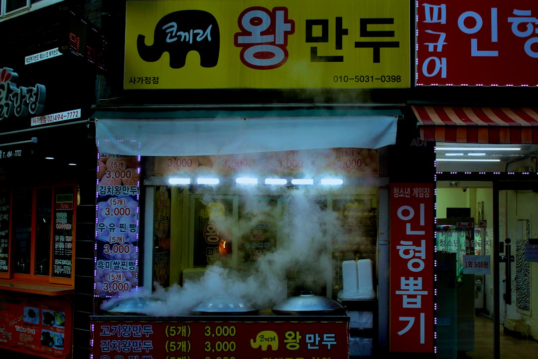 red and black coca cola vending machine