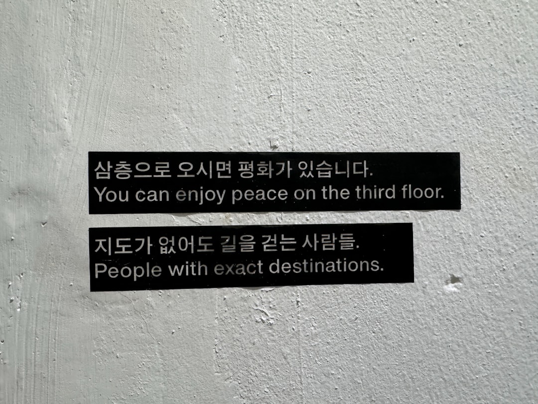 A sign on a wall that says you can enjoy peace on the third floor
