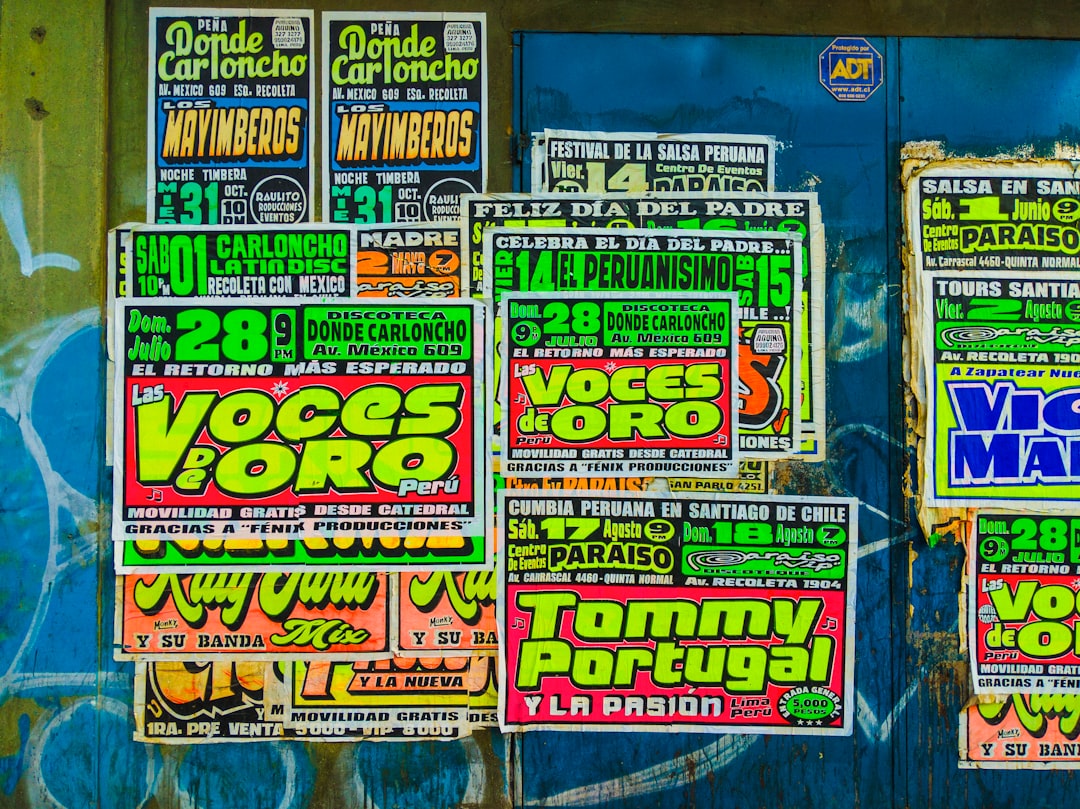 assorted posters on mural wall