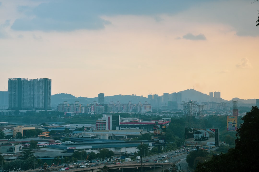 city skyline under white sky during daytime