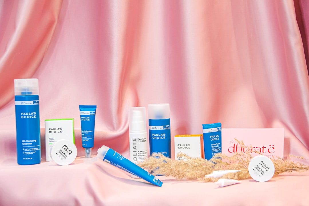 blue click pen beside blue and white box