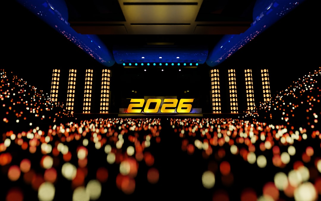 Stage with 2026 displayed and blurred audience lights