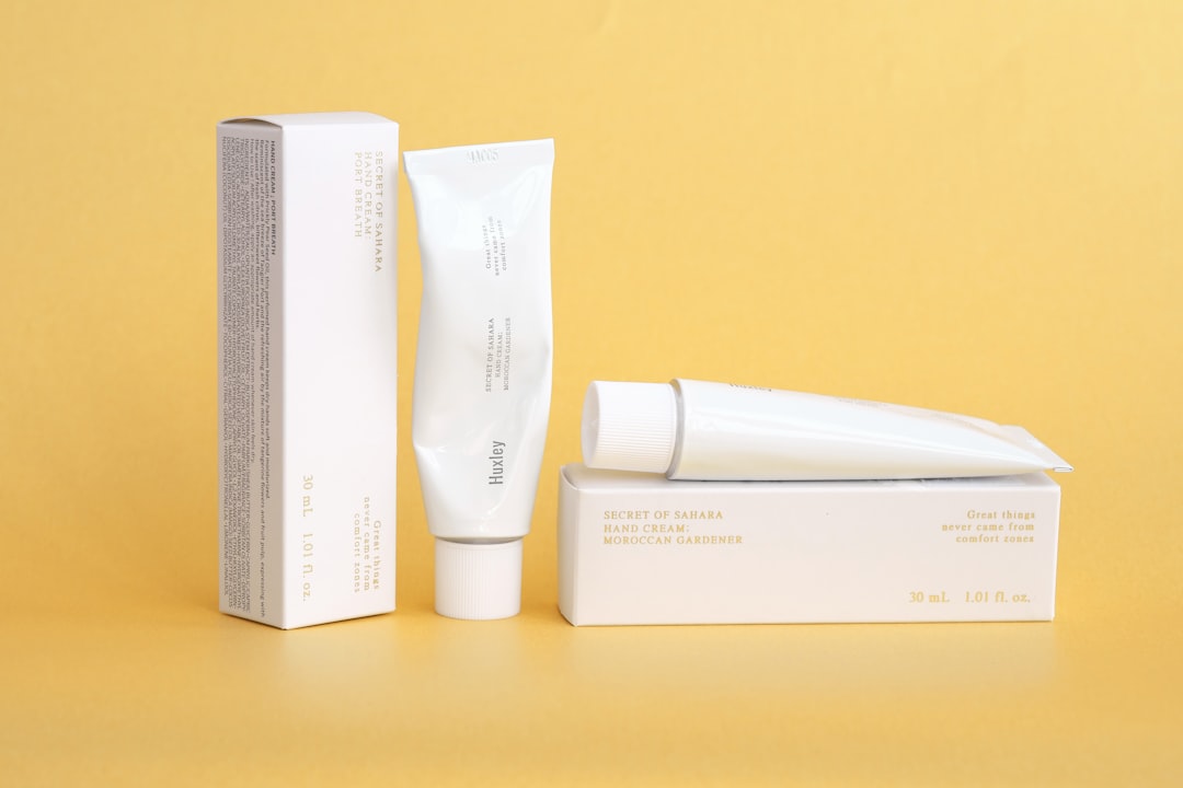 Cream tubes with their respective boxes are shown.