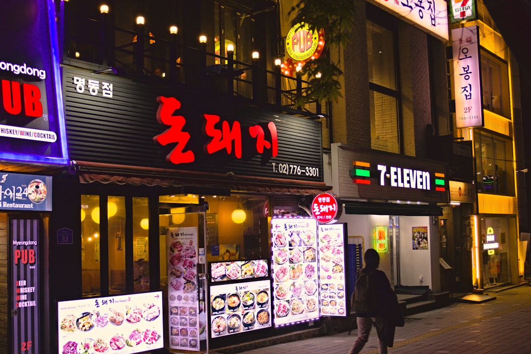 Korean street at night with illuminated signs