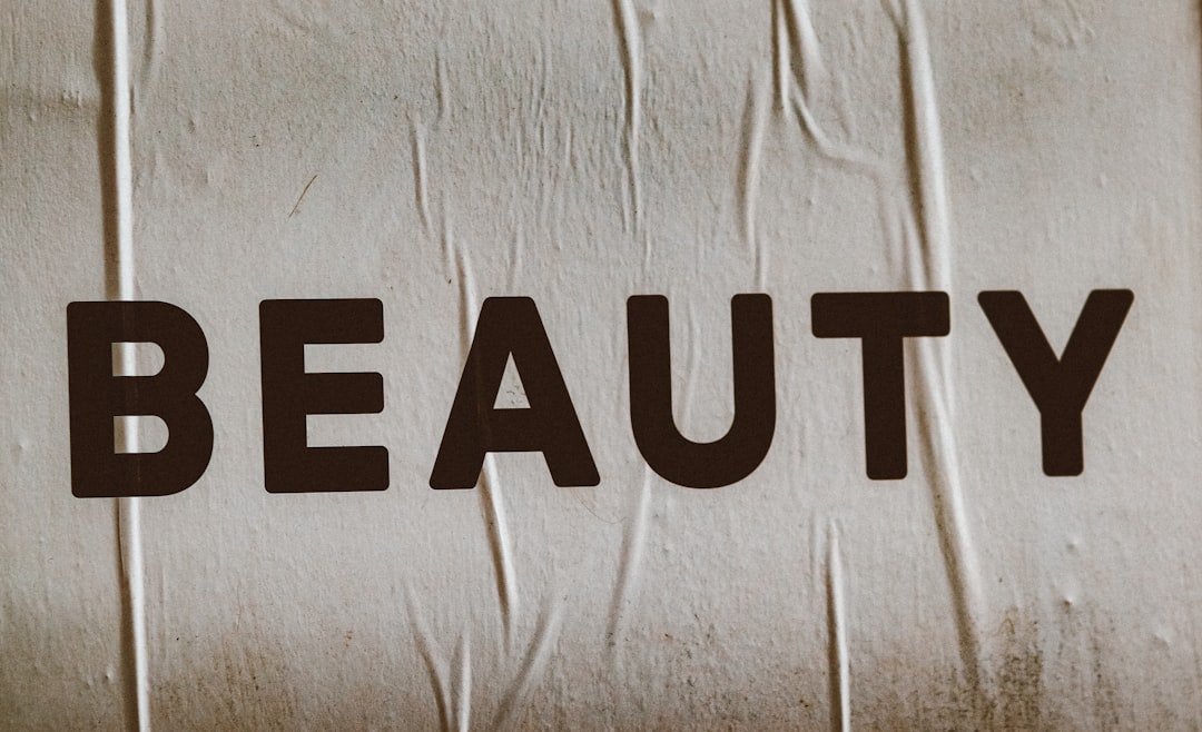 a close up of the word beauty on a piece of paper