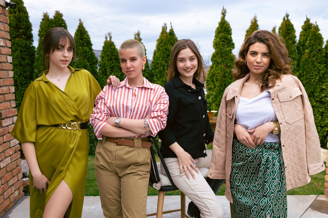 a group of women standing next to each other