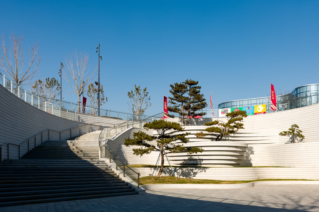 A large white building with steps leading up to it