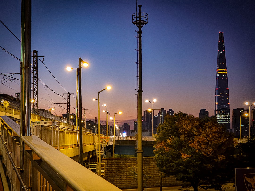 Cityscape with tall skyscraper at dusk