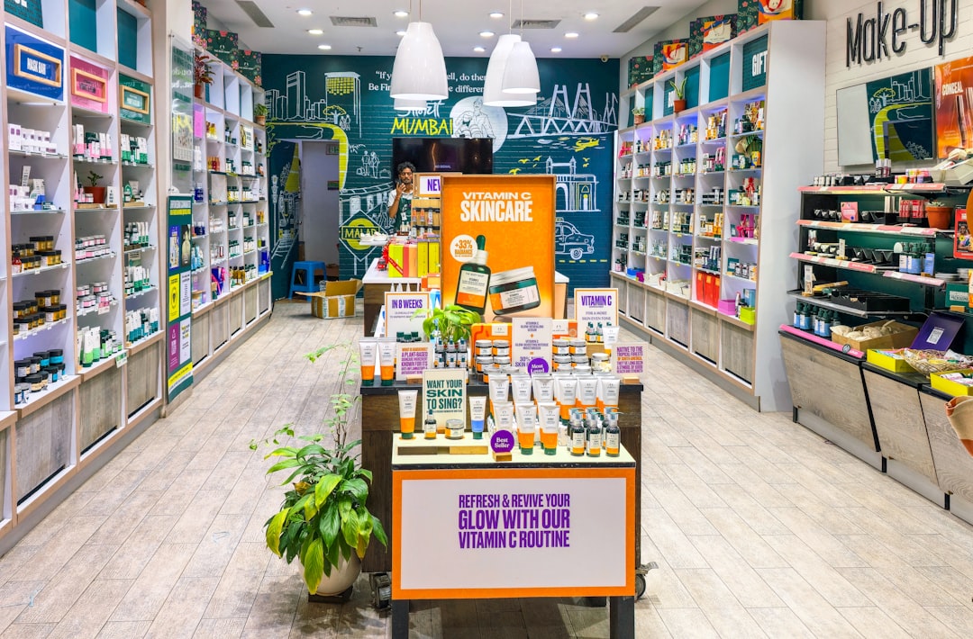 A well-stocked cosmetics store interior with shelves of products.