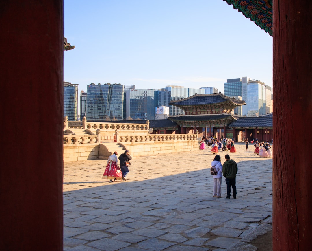 A group of people standing around a courtyard