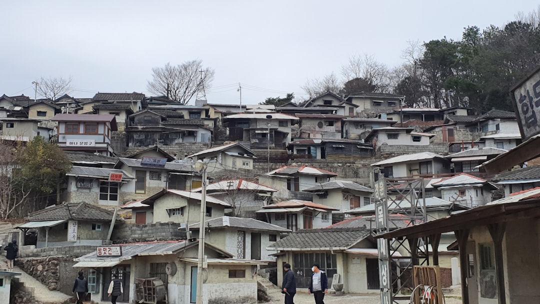 A hillside village with many small houses